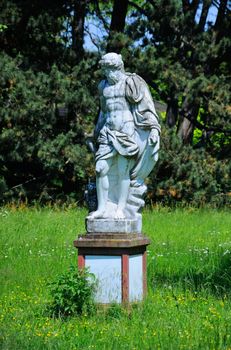 A sculpture of a man in Palmen Garten, Frankfurt am Main, Hessen, Germany