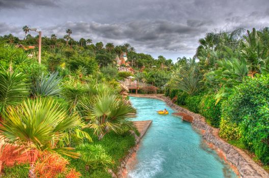 River in the park with palms, Tenerife, Canarian Islands