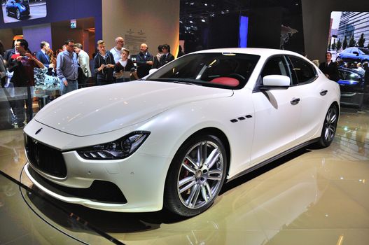 FRANKFURT - SEPT 14: Maserati Ghibli presented as world premiere at the 65th IAA (Internationale Automobil Ausstellung) on September 14, 2013 in Frankfurt, Germany