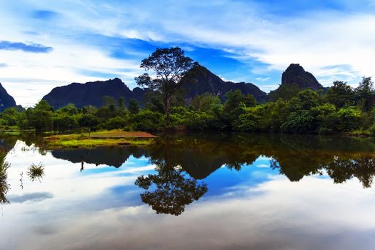 Reflections of Laos. River Landscape. Khammouane province.