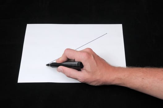 A Caucasian Male Hand Drawing on a White Paper