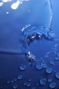 Some Water Drops on a Blue Textured Background