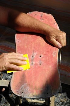 Restore an Old Skateboard with a Yellow Sandpaper