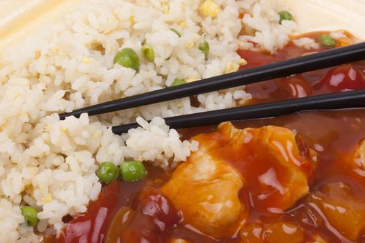 Closeup photo of chinese sweet and sour chicken with rice.