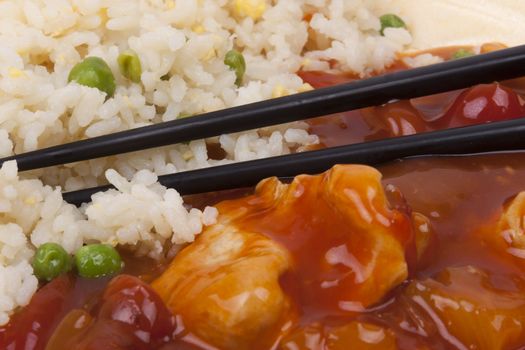 Closeup photo of chinese sweet and sour chicken with rice.