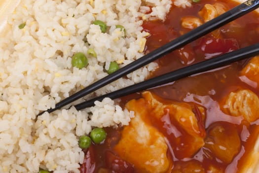 Closeup photo of chinese sweet and sour chicken with rice.