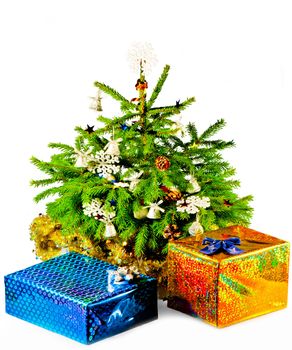 Christmas tree with gifts on a white background