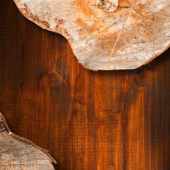 Wooden background with trunk section and shadows