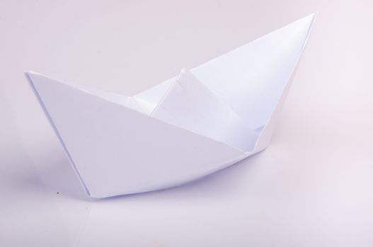 An image of white origami boat 