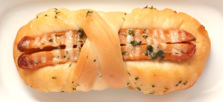 Sausage bread on plate isolated on a white background 