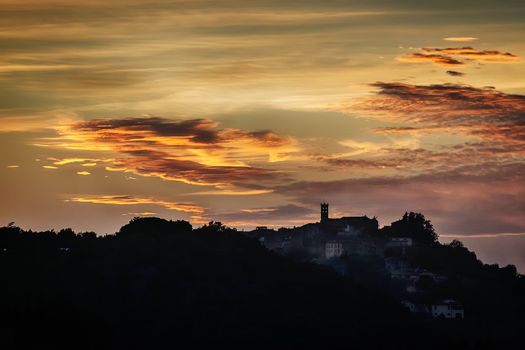 Dramatic clouds in a Tuscany landscape at sunset