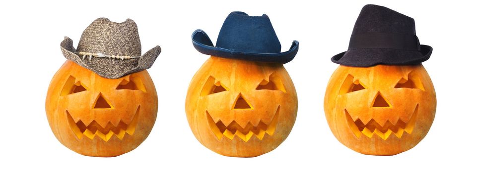 Three cowboy pumpkins with three different hats
