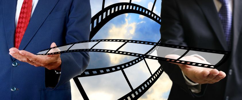 Businessman send movie film to buyer, Movie business concept