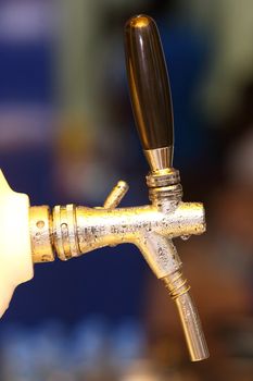 Close up beer dispenser valve