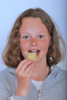 Girl eating chip