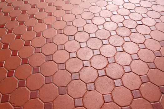 Red color footpath concrete block