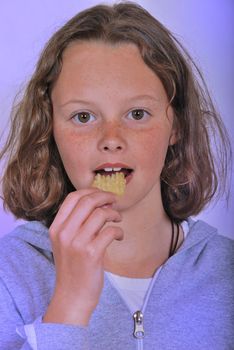 Girl eating chip