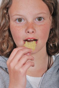 Girl eating chip