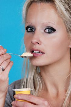 young woman eatin cream