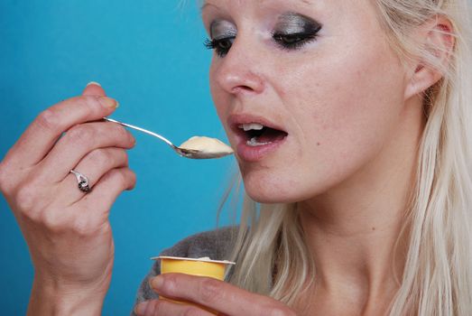 young woman eatin cream