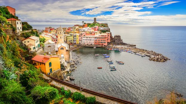 Panoramic view of colorful Vernazza village and ocean coast in Cinque Terre
