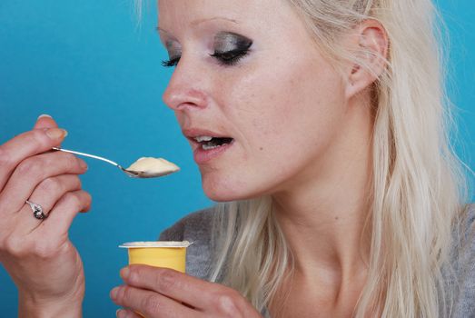 young woman eatin cream
