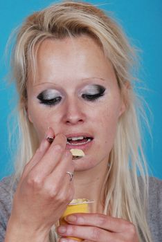 young woman eatin cream