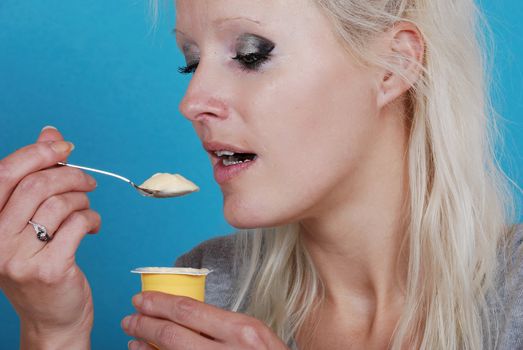young woman eatin cream