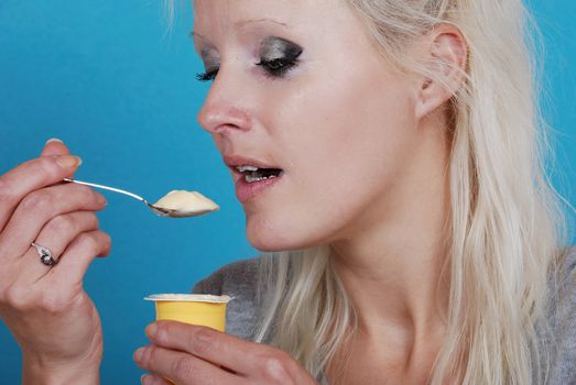 young woman eatin cream
