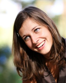 emotional portrait of a cheerful girl. Outdoor portrait