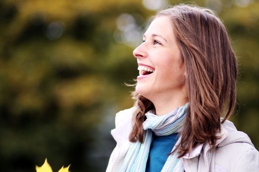 Closeup portrait of a happy young woman smiling