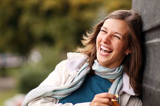 Closeup portrait of a happy young woman smiling