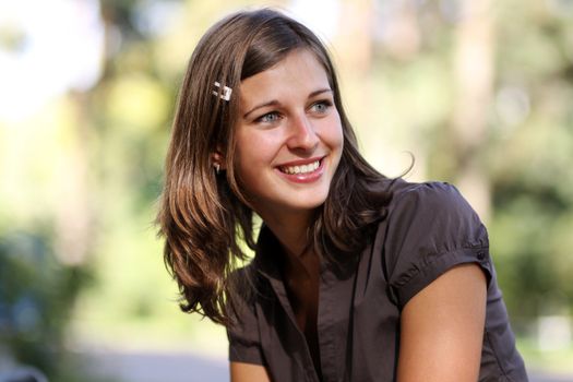 emotional portrait of a cheerful girl. Outdoor portrait