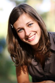 emotional portrait of a cheerful girl. Outdoor portrait