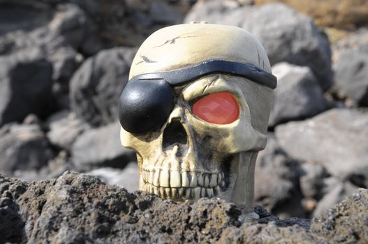 One Pirate Skull with a Red Eye and a Patch