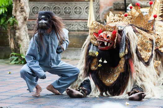 BALI - SEP 21: Barong and Kris Dance performs at Sahadewah, in Batubulan, Bali, Indonesia on Sep 21, 2012. This famous play represents an fight between good and bad gods.