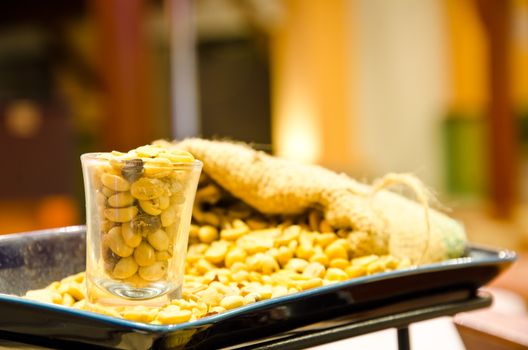 Fresh coffee beans on glass.