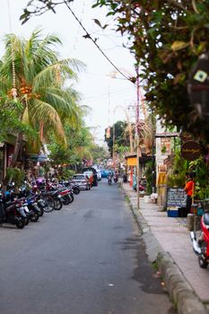 UBUD, BALI, INDONESIA - SEP 19: Tourist area street with restaurants, cafes and shops on Sep 19, 2012 in Ubud, Bali, Indonesia. Ubud is popular tourist attraction.