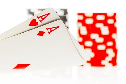 Pair of aces and poker chips