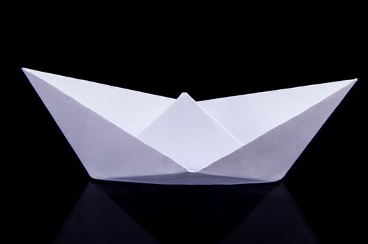 An image of white origami boat 