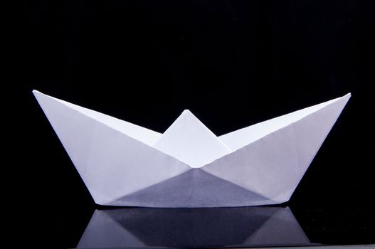 An image of white origami boat 