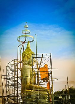 The Under Construction of Seated Buddha Image in Attitude of Subduing Mara.