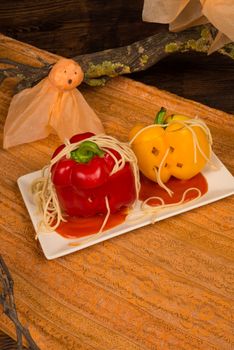 Halloween still life with fake pumpkins served as a kid meal