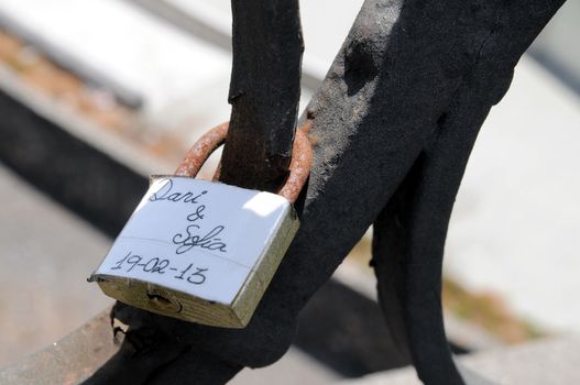 A Colored Metal Lover's Lock on a Bridge