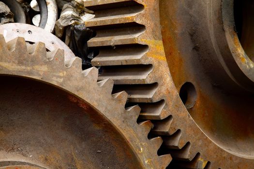 Old rusty gears of a steel machinery