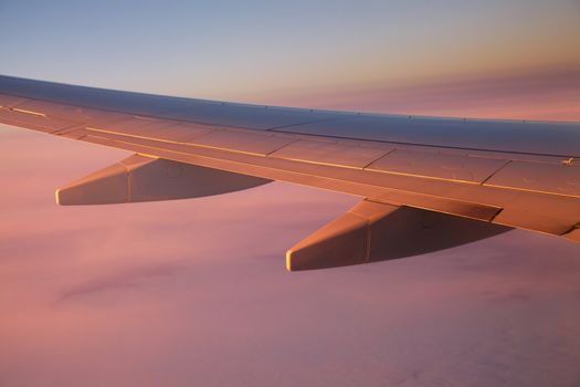 Sunrise view from an aircraft - Never forget to book a seat by the window