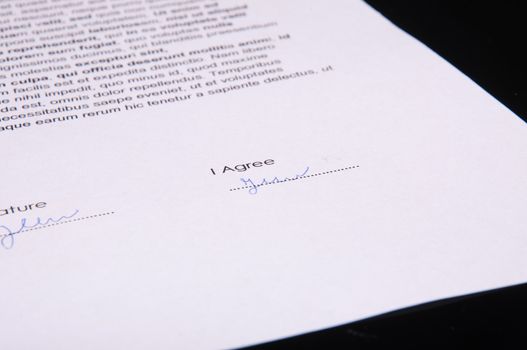 An image of signature over agreement