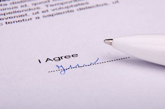 An image of signature over agreement