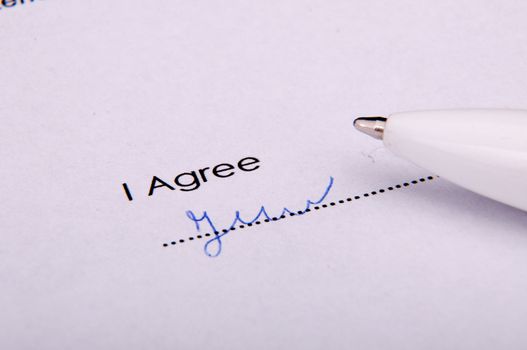 An image of signature over agreement
