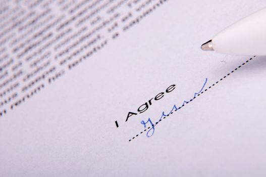 An image of signature over agreement